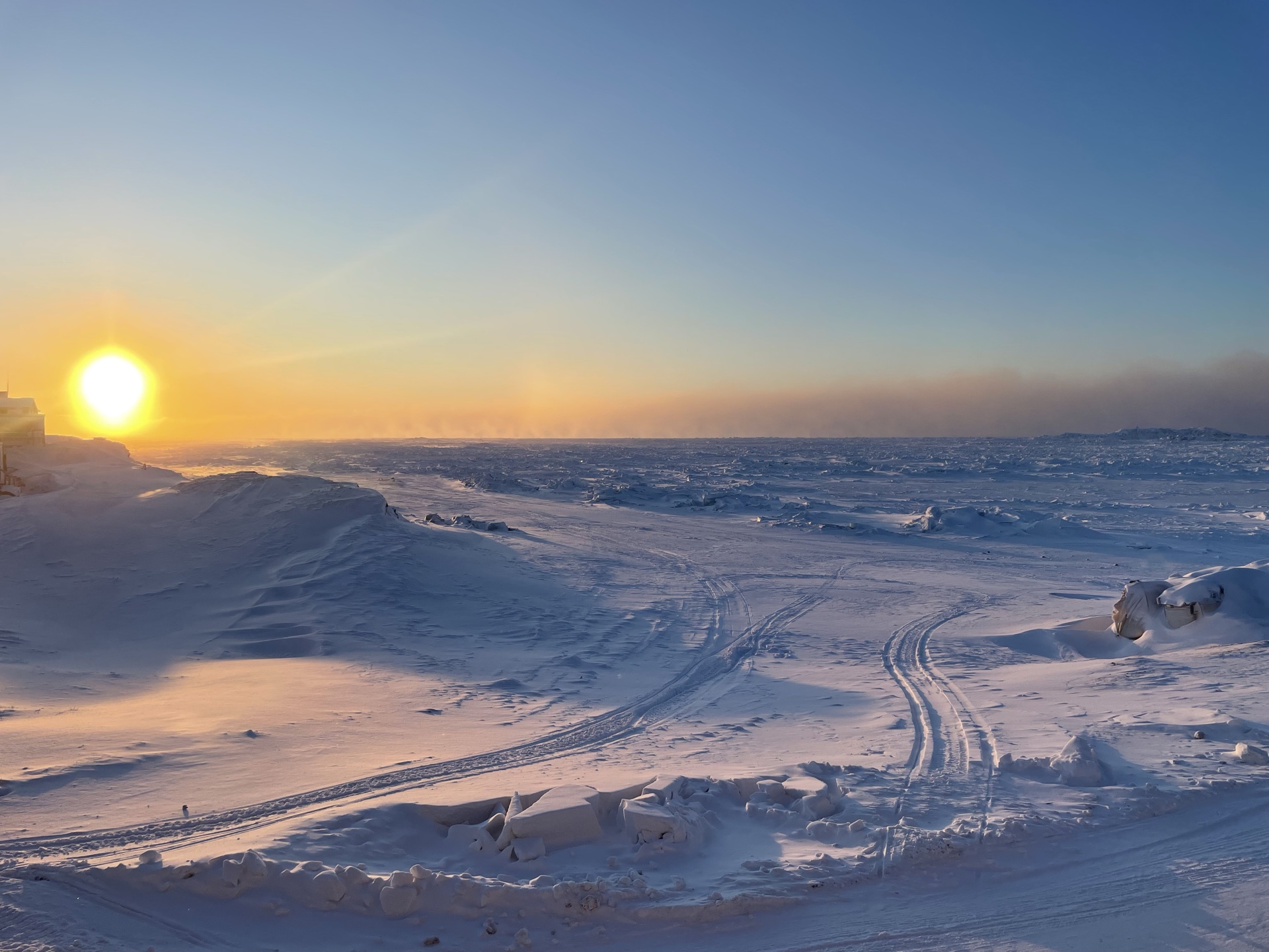 Winter sunrise over the frozen Chukchi Sea at Utqiaġvik, Alaska